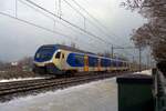 Am verschneeten 23 Jänuar 2019 durchfahrt NS 2230 Wijchen und wird der Bahnhof innerhalb eine Minute erreichen.