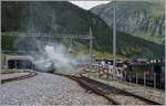 100 Jahre Brig -. Gletsch: auch wenn nicht sofort zu erkennen, zeigt dieses Bild gleich drei HG 3/4: Links die angetäuscht aus dem Furkatunnel kommende Blonay.Chanmby HG 3/4 N° 3, in der Bildmitte im Zahnstangenabschnitt die DFB HG 3/4 N° 4 und rechts im Bild wartet die DFB HG 3/4 N° 1 auf die Abfahrt Richtung Gletsch.

16. Aug. 2014