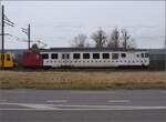 S26-BB-und-IGS-Minitreffen.

In Ruderbach auszusteigen, war keine schlechte Wahl, denn wie ein Blitz kam eine interessante Fuhre mit dem TPF-NPZ BDe 567 171 daher und modifizierte unsere Reisepläne gen St. Margrethen. Aber zuvor musste erst die Durchfahrt von Liseli abgepasst werden. Februar 2023.