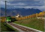 Der ASD BDe 4/4 N� 402 ist mit seinem Bt als Regionalzug 428 oberhalb von Aigle unterwegs.