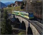 Der AOMC Beh 4/8 592, unterwegs als Regioanlzug 29 von Champéry nach Aigle  erreicht in Kürze die Haltestelle  Pont de Chemex .