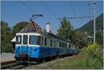 Als Leeermaterialzug auf der Fahrt nach Montreux muss der MOB BDe 8/8 4004 Fribourg in Fontanivent kurz auf die Streckenfreigabe (Blockdistanz) warten.